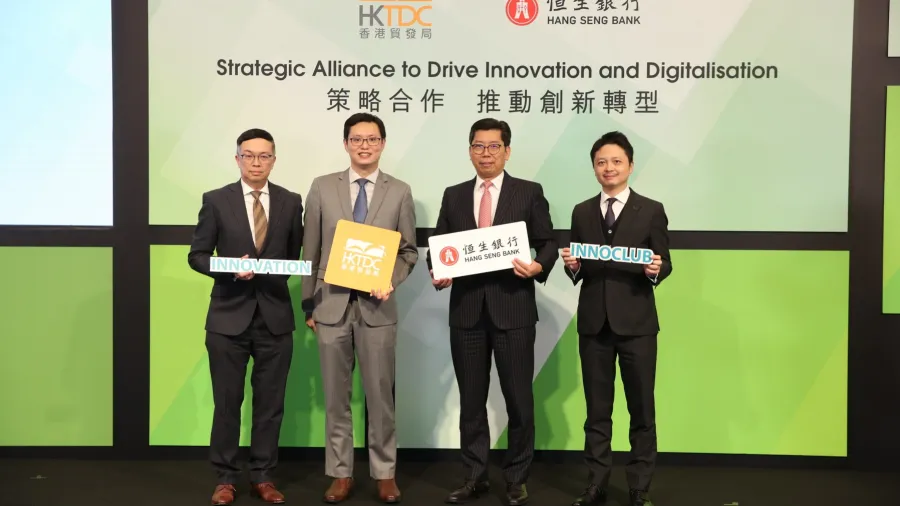 Mr. Stephen Liang, Assistant Executive Director at Hong Kong Trade Development Council (first left), Dr. Patrick Lau, Deputy Executive Director of Hong Kong Trade Development Council (second left), Mr. Donald Lam, Head of Commercial Banking at Hang Seng Bank (second right) and Mr. Gilbert Lee, Head of Strategy & Planning and Chief of Staff to Chief Executive at Hang Seng Bank (first right) at the signing ceremony of the strategic partnership between Hang Seng Bank and Hong Kong Trade Development Council.