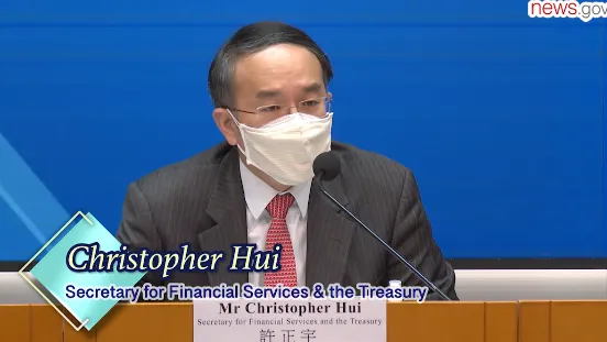 Financial Services and Treasury Secretary Christopher Hui at a press conference. Source: Livestream of state media news.gov.hk :