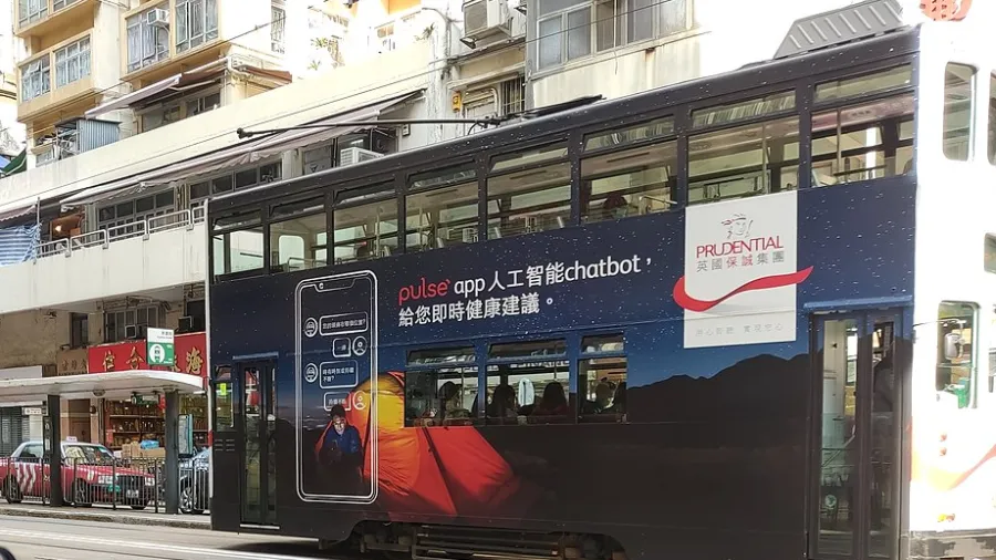 A Prudential ad featured on a bus in Hong Kong (Photo by GUANKWUZEAKIM via Wikimedia Commons (Creative Commons License))