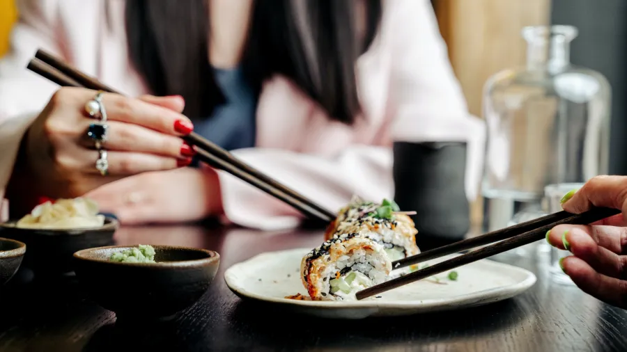 Photo by Ivan Samkov: https://www.pexels.com/photo/person-in-white-long-sleeve-shirt-holding-chopsticks-8951500/