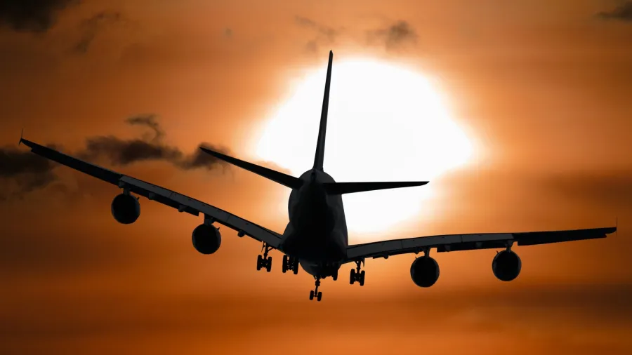 Photo by Pixabay: https://www.pexels.com/photo/shadow-image-of-a-plane-flying-during-sunset-104826/