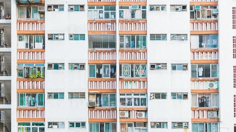Photo by Gorma Kuma: https://www.pexels.com/photo/aerial-photography-of-black-vehicle-on-road-and-person-standing-near-high-rise-buildings-3251362/