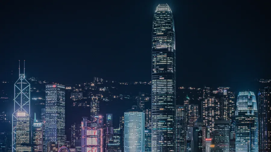 Hong Kong's iconic skyline; some banks' headquarters in the city can be seen. Photo by Daniam Chou via Unsplash.