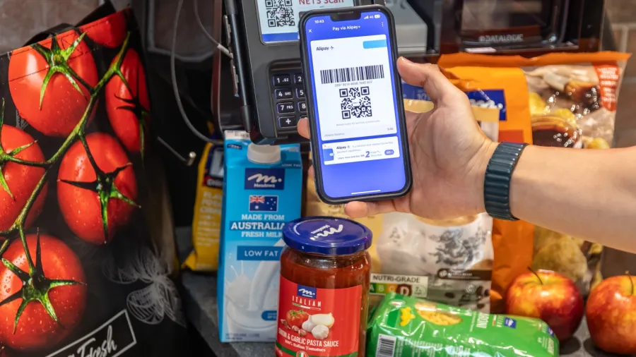 Photo from DFI Retail Group, NETS, and Alipay+.