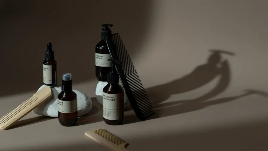Photo by cottonbro studio: https://www.pexels.com/photo/photo-of-combs-near-bottles-7428097/