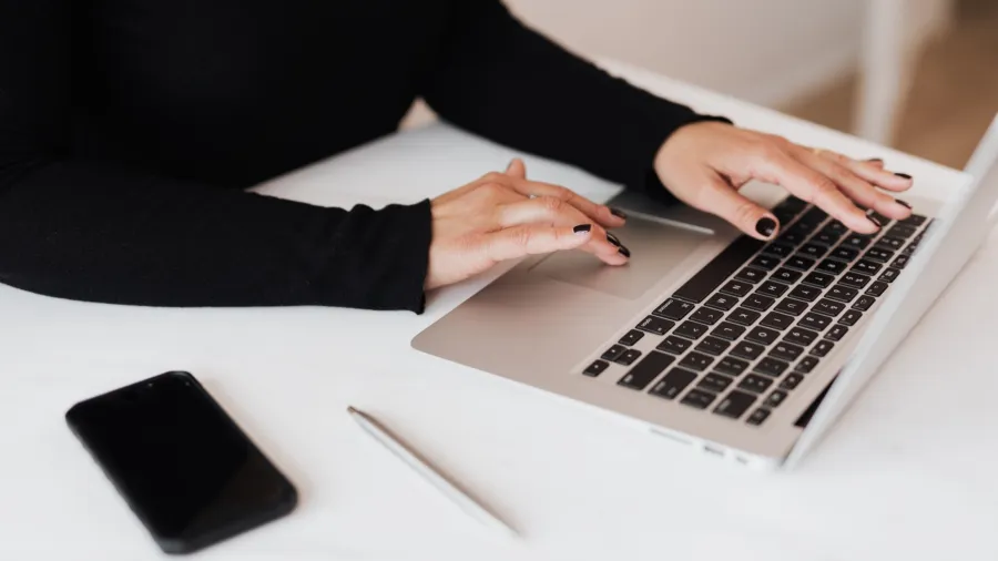 Photo by Karolina Grabowska: https://www.pexels.com/photo/crop-faceless-woman-working-on-netbook-in-office-4467735/