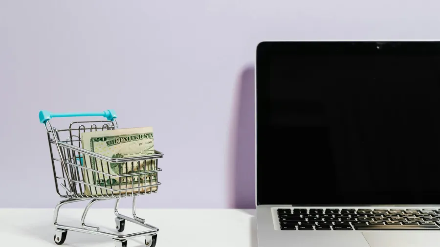Photo by Karolina Grabowska: https://www.pexels.com/photo/shopping-cart-next-to-a-laptop-5632397/