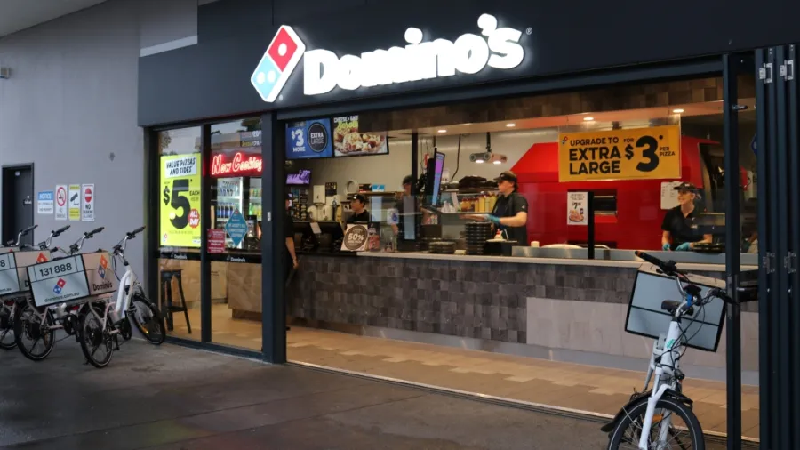 Press photo. /Domino's