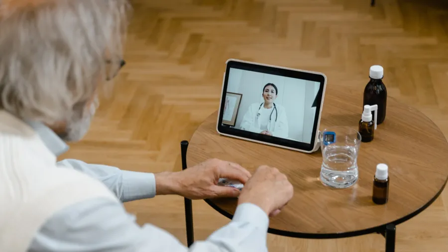 Photo by Tima Miroshnichenko: https://www.pexels.com/photo/a-doctor-doing-an-online-consultation-8376177/