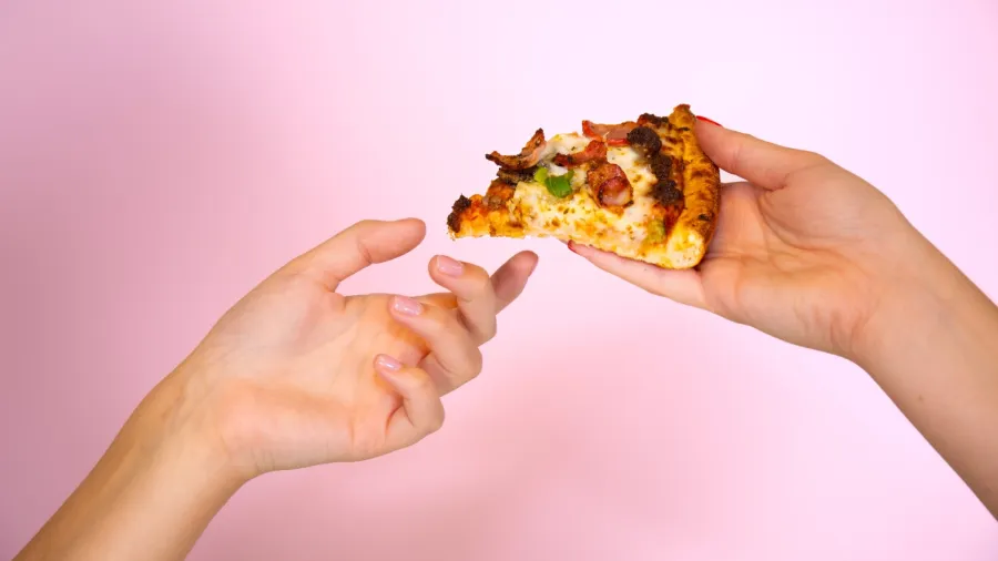 Press photo. /Domino's