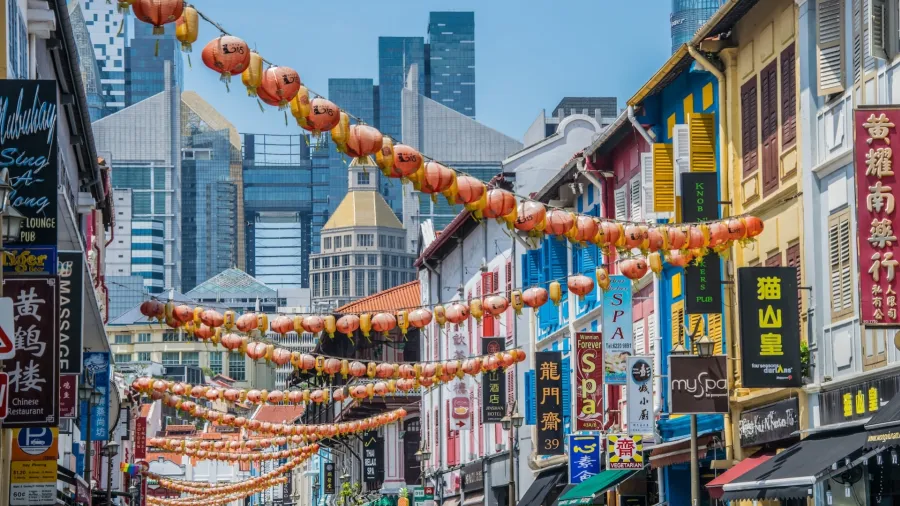 Rows of Singapore shophouses. Photo by Adrian Jakob via Unsplash.