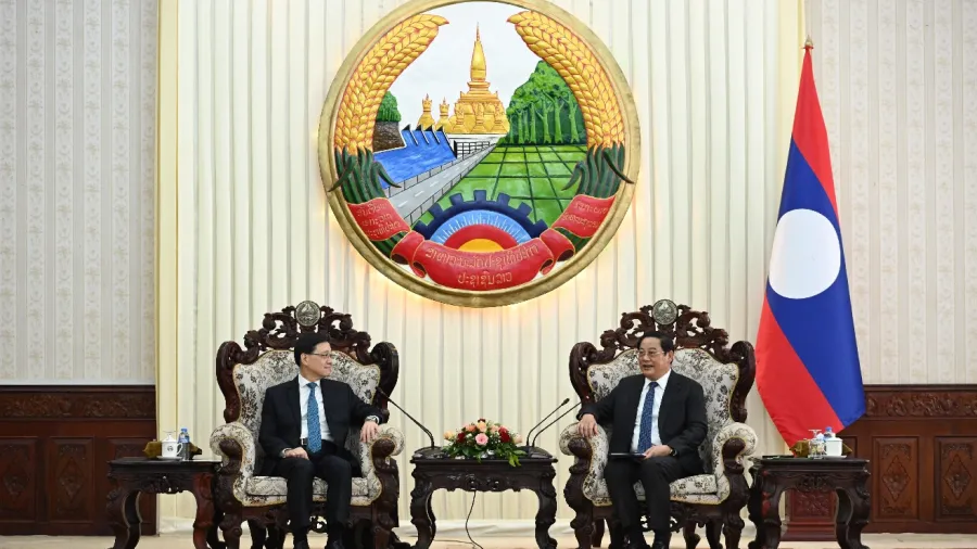 Hong Kong’s Chief Executive John Lee (left) meets Laos Prime Minister Sonexay Siphandone.