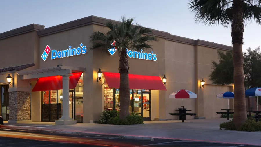 Press photo. /Domino's