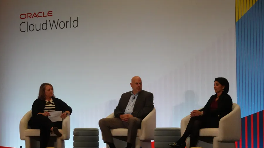 Mike Sicilia, Executive Vice President of Oracle Global Industries (center) and Seema Verma, Executive Vice President and General Manager of Oracle Health and Life Sciences (rightmost) during the healthcare panel at the Oracle Cloud World 2024 in Las Vegas, Nevada