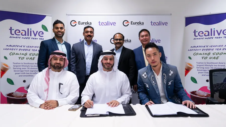 Bryan Loo, CEO and founder of Loob Holding (right), Abdulwahab Galadari, Ilyas & Mustafa Galadari (IMG) Group chairman (centre), Marwan Galadari, IMG Group director (left). (Behind from left) Ayub Khan, Eureka head of operations and growth, Disney Casper, Eureka head of finance, Dinkar Ayyathan, Eureka head of procurement, and Mario Malalis, General Manager for International Franchise for Tealive.