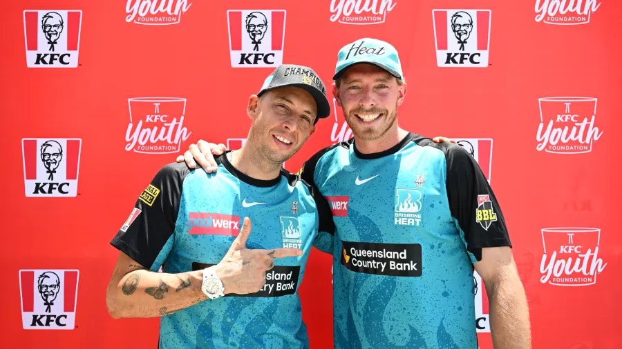 Example and Brisbane Heat's Jack Wood.