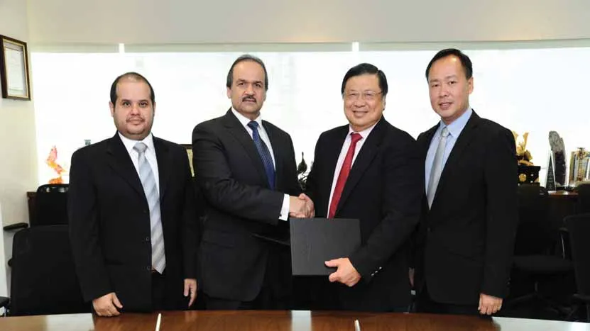 Gulf Drilling International orders its fifth KFELS B Class Tackup rig from Keppel FELS. At the signing ceremony on 16 September 2014 are (from left) Mr Fahad Al-Ahbabi, Commercial Manager of GDI; Mr Ibrahim Al-Othman, CEO of GDI shaking hands with Mr Wong Kok Seng, Managing Director of Keppel O&M (Offshore) and Keppel FELS, and Mr Chris Ong, Executive Director (Commercial) of Keppel FELS