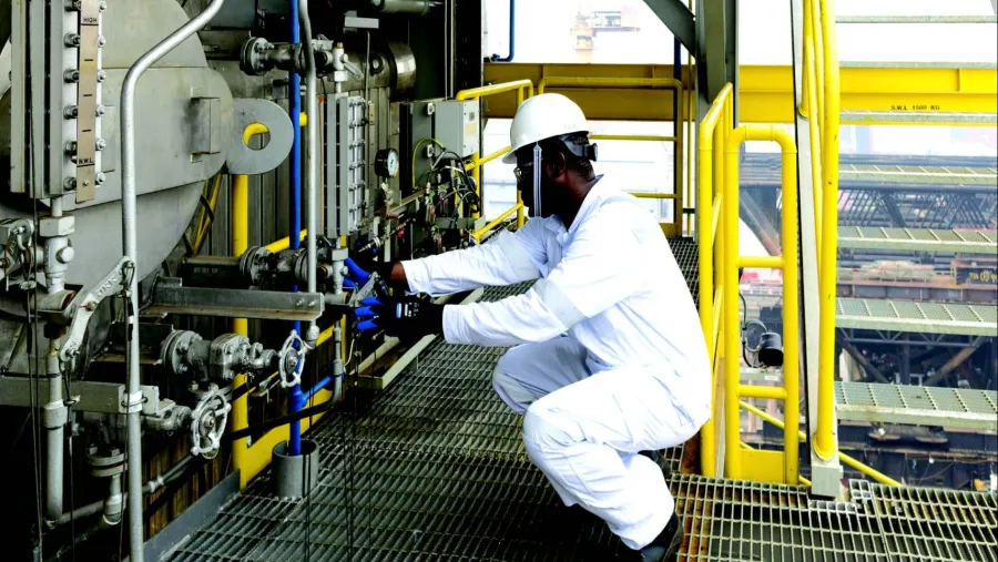 A DNV GL HazMat Expert doing a visual check for pipe gasket sampling.