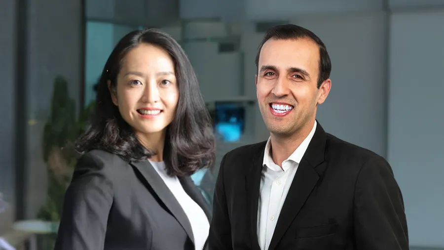 Laurel Hu, head of casualty underwriting for the region at Swiss Re Ltd. (Left); Angat Sandhu, a partner at McKinsey & Co. (Right)