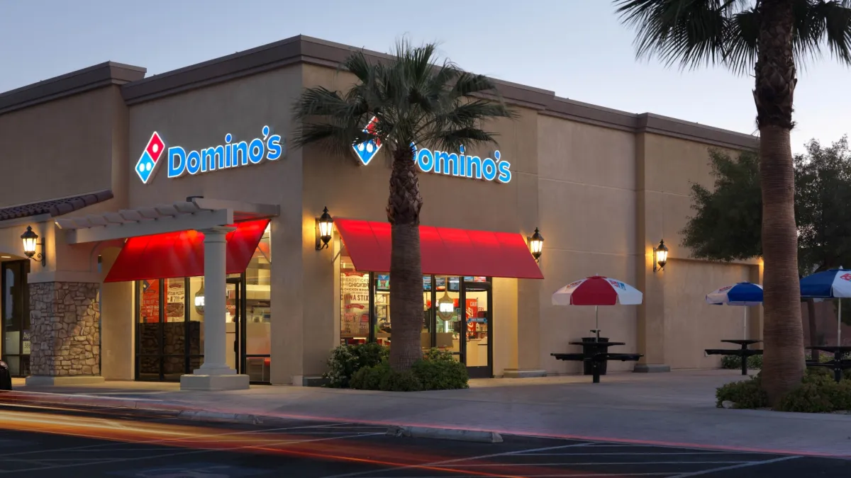Domino's eyes bigger slice of UK chicken market as H1 profit rises