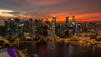 Singapore banks to see NIM compression and management fee surge in Q3: UOBKayHian